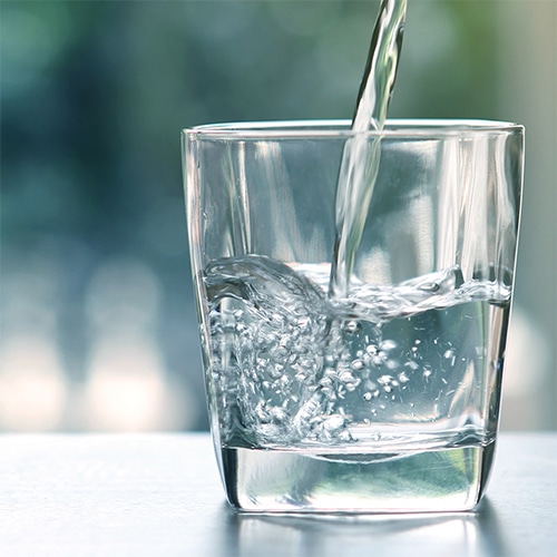 water being poured into a glass