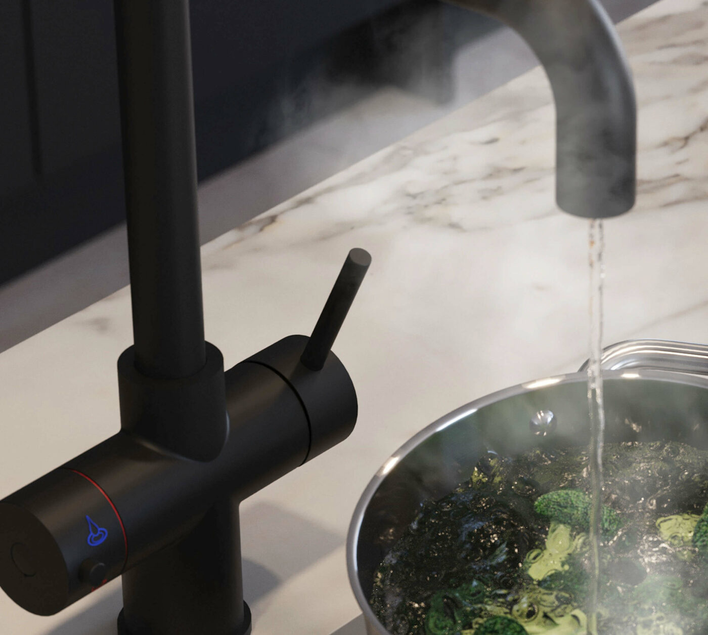 dispensing boiling water to a pan with broccoli from a D-shape 3 in 1 black boiling water tap