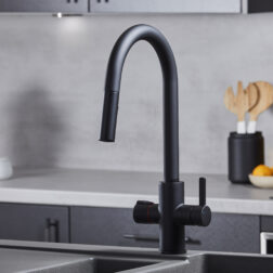 a swan neck pull-out hot water tap in matte black