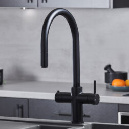 a swan neck pull-out hot water tap in matte black