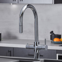 a swan neck pull-out hot water tap in chrome