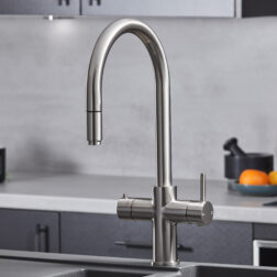 a swan neck pull-out hot water tap in brushed nickel