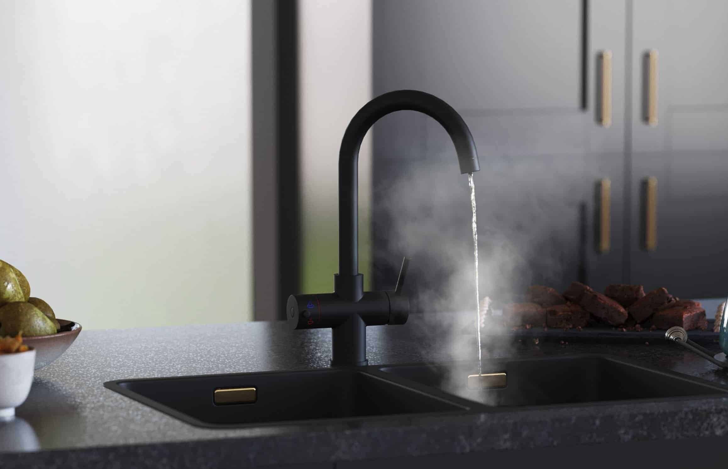 Boiling Water Taps: Debunking The Myths 1 The Helena Swan Neck tap dispensing boiling water into the sink.